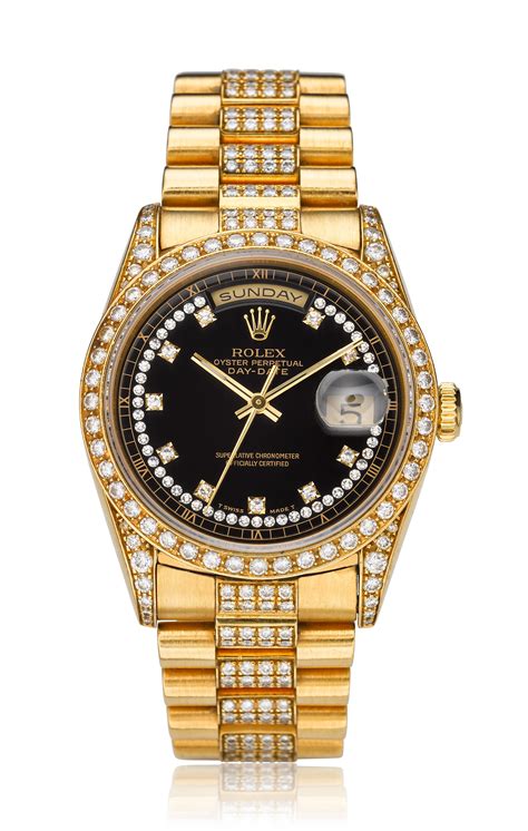 rolex day date 18k gold.